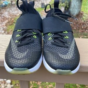 Nike training, zoom sneaker, black and white with a neon green accent size 5